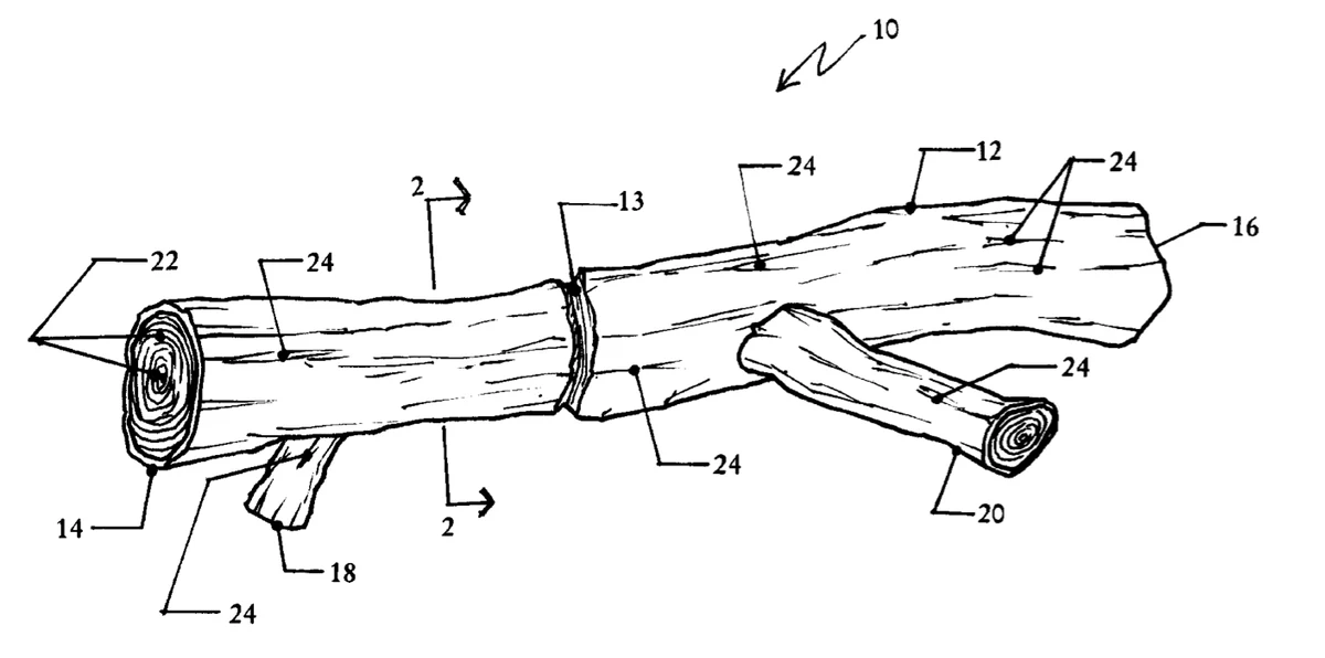 Zeichnung aus dem US-Patent 6,360,693: ein Hundespielzeug in Form eines Asts mit seitlichen Fortsätzen